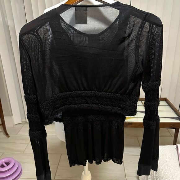 Authentic Black CHANEL Cropped Cardigan
P22387W03216 - Picture 6 of 16